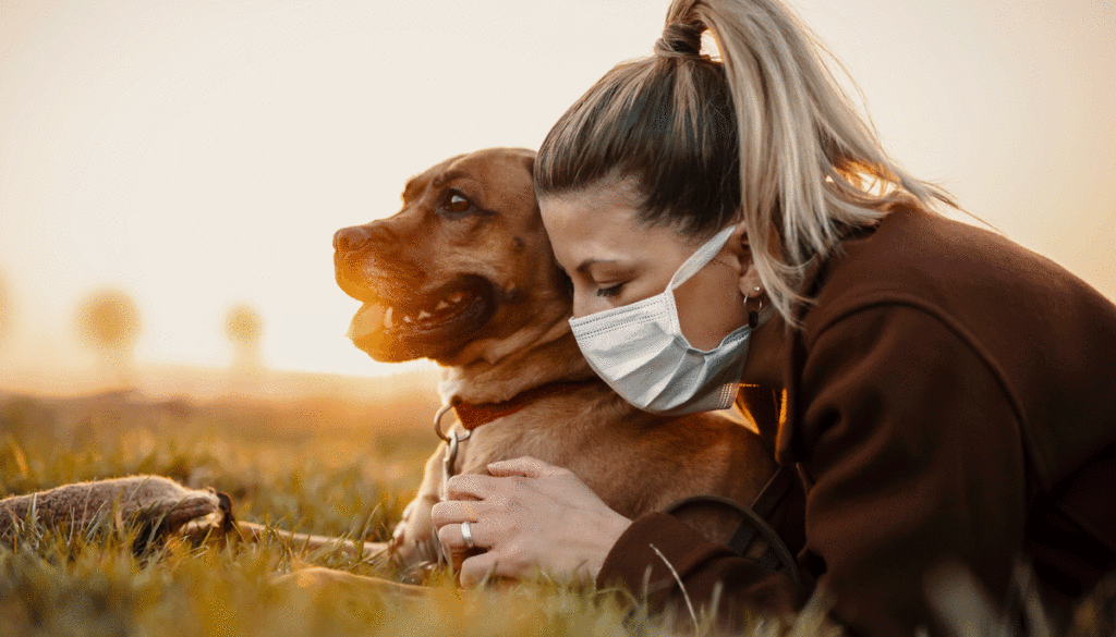 women-hugging-dog