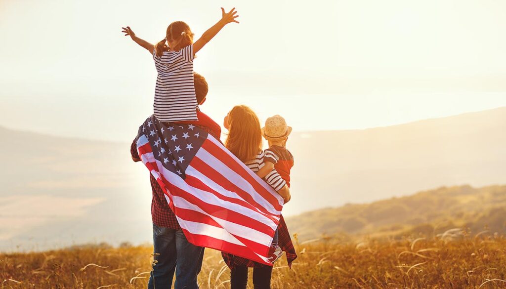 family celebrating fourth of july