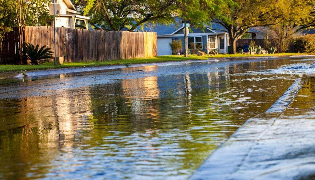 Flooded neighborhood street after thunderstorm