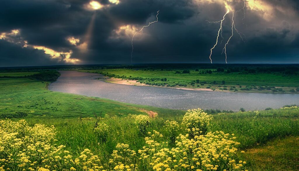 Summer storm over a river